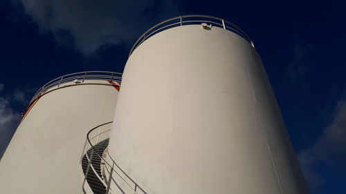 Low angle view of chain against sky