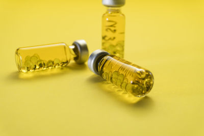 Close-up of yellow bottle