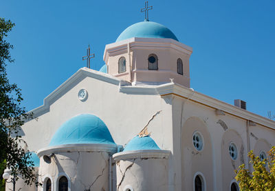 Blue white church in kos city after an earthquake damaged