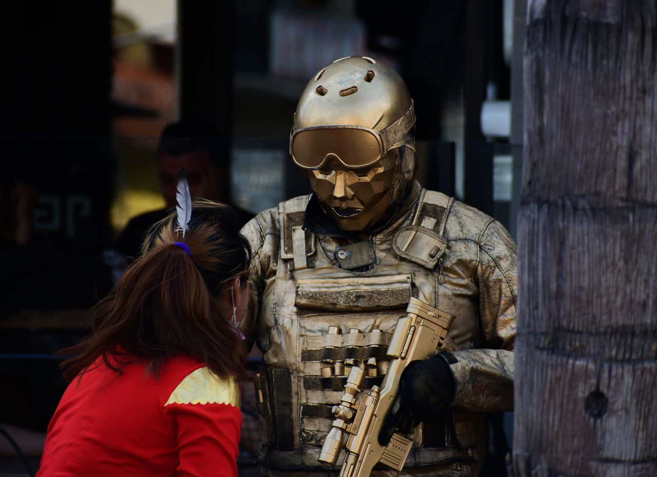 adult, protection, two people, person, weapon, security, clothing, government, gun, men, military, waist up, screenshot, armed forces, uniform, helmet, headwear, soldier, mask, architecture, standing