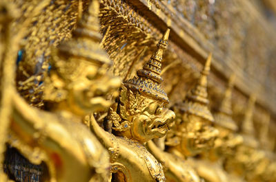 Low angle view of statues at wat phra kaew