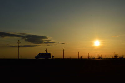 Scenic view of silhouette landscape against sky during sunset