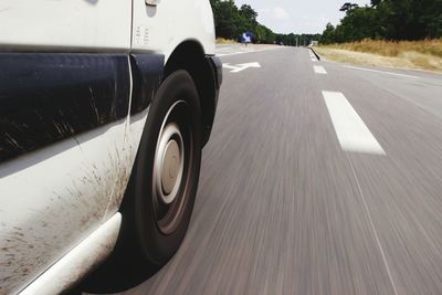Low section of car on road