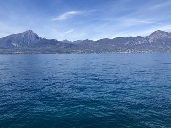 Scenic view of sea against blue sky