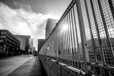 Black and white street view from sidewalk