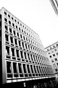 Low angle view of modern building against clear sky