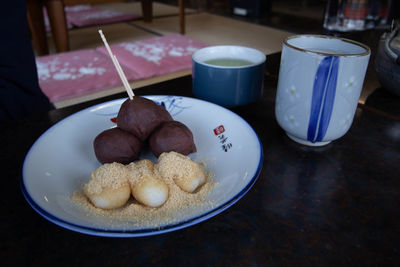 Close-up of breakfast served on table