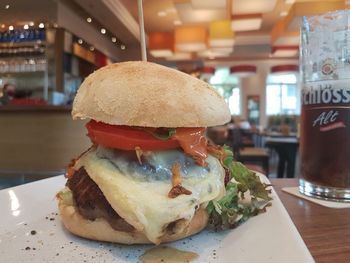 Close-up of burger on table in restaurant