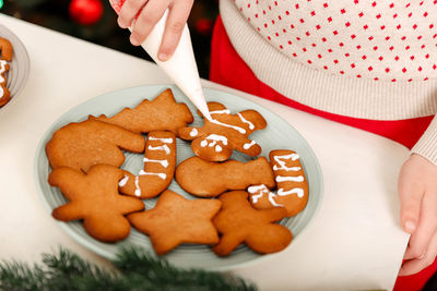 Cooking christmas gingerbread. festive food, xmas traditions.