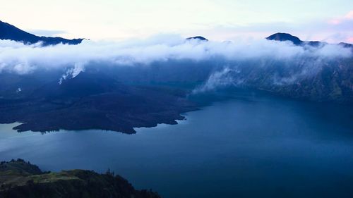 Gorgeous green mountain view with blue sky, located in lombok indonesia.