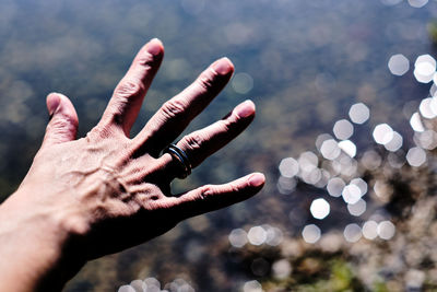 Close-up of person holding hands