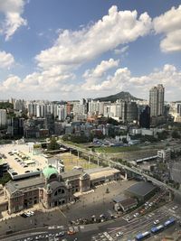 High angle view of street amidst buildings in city