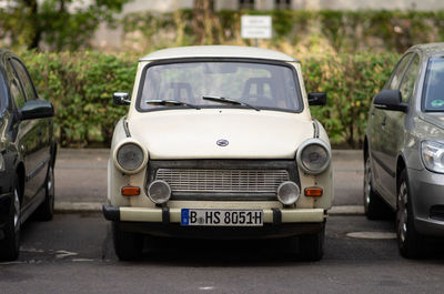 Vintage car parked on street in city