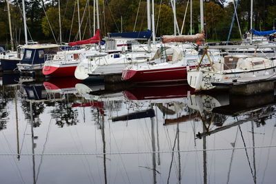 Boats moored at harbor