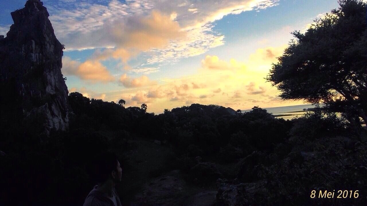 sky, scenics, tranquility, beauty in nature, silhouette, mountain, tranquil scene, tree, nature, cloud - sky, rock - object, rock formation, sunset, landscape, non-urban scene, idyllic, cloud, outdoors, tourism