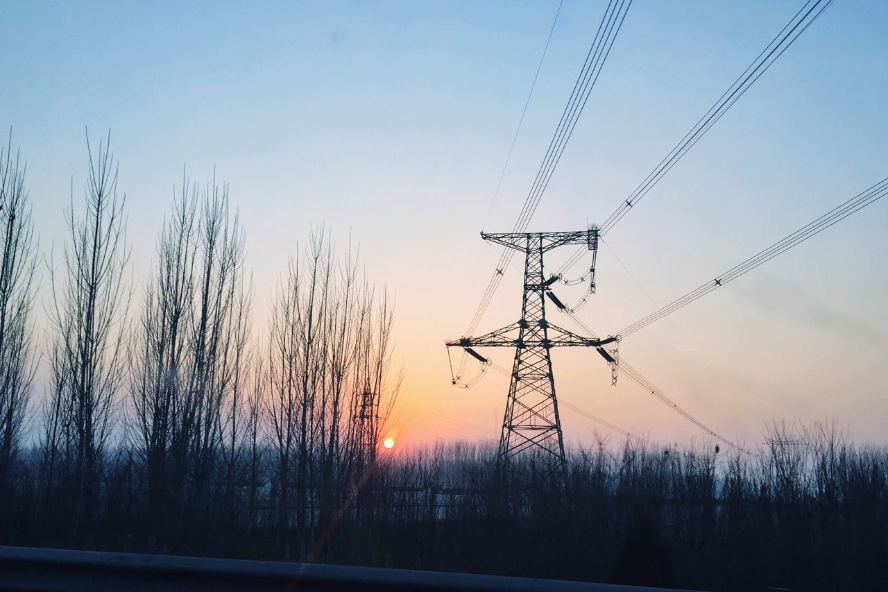 sunset, electricity pylon, silhouette, power line, electricity, tranquility, fuel and power generation, power supply, clear sky, landscape, tranquil scene, nature, field, sky, connection, scenics, technology, beauty in nature, dusk, bare tree