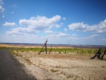 Scenic view of beach against sky