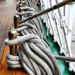 Close-up of ropes on wooden table