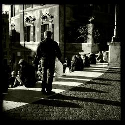 Woman standing in city