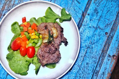 High angle view of food in plate on table