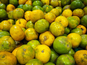 Full frame shot of lemons in market