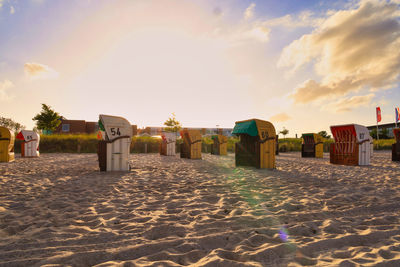 Panoramic view of beach against sky during sunset