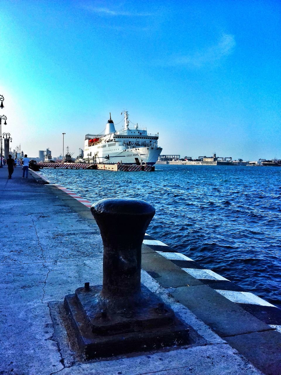 water, architecture, transportation, sea, day, sky, blue, nature, nautical vessel, no people, harbor, ship, built structure, outdoors, bollard, clear sky, travel, pier, mode of transportation