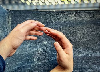 High angle view of people hand