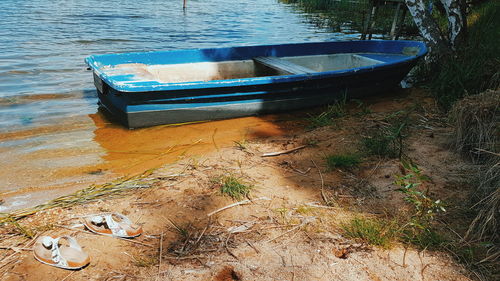 High angle view of abandoned boat moored on shore