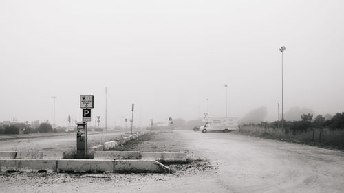 Road against clear sky during winter