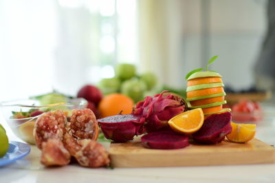 Close-up of fruits in plate on table