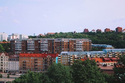 Residential buildings against clear sky