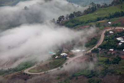 High angle view of road amidst mountains