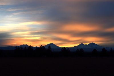 Scenic view of mountains at sunset