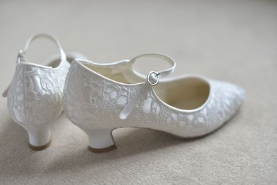 Close-up of shoes on table