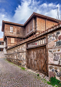 Low angle view of old building against sky