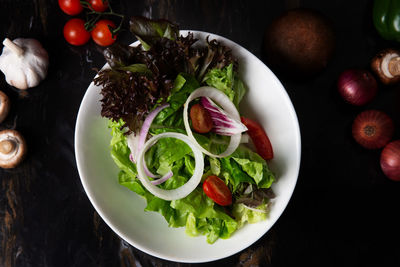 High angle view of salad served on table