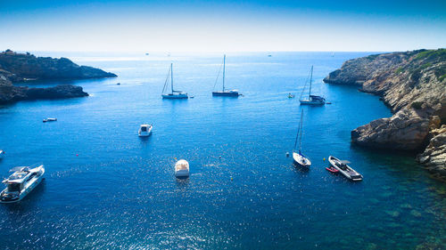 High angle view of boats sailing in sea