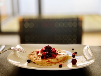 Close-up of cake in plate on table