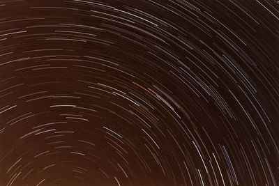 Full frame shot of star trails at night