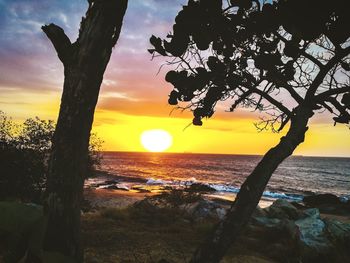 Scenic view of sea against sky during sunset