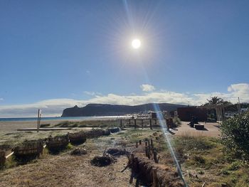 Scenic view of sea against sky on sunny day