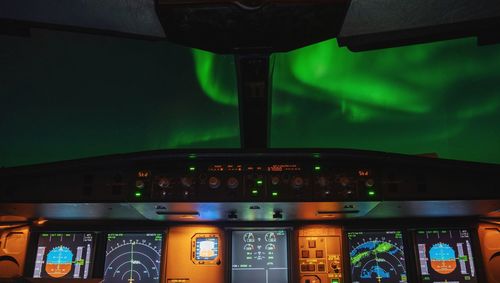 View of illuminated airplane at night