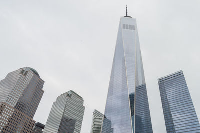 Low angle view of skyscrapers against sky