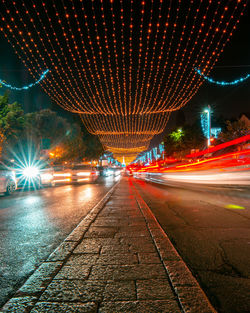 Light trails on city street at night