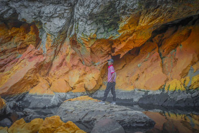 Man standing on rock formation