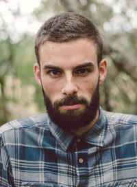 Close-up portrait of bearded man