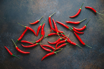 Close-up of red chili pepper against white background