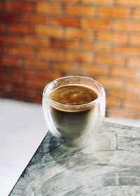 Close-up of coffee cup on table