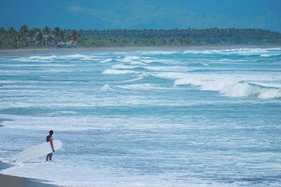 Man surfing in sea